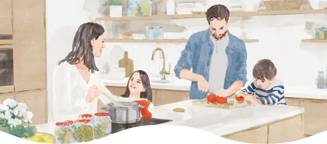 キッチンで家族みんなで料理を楽しむイラスト